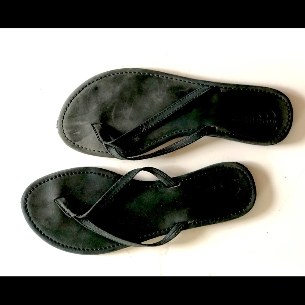 Black leather rainbow flip flops